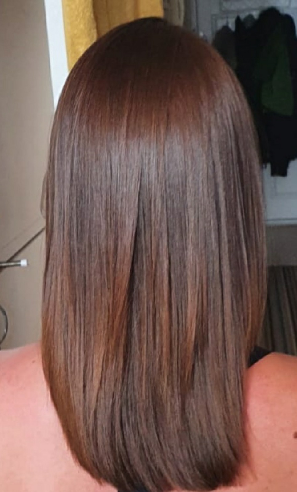 glossy brown straightened hair